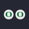 White Oregon Ducks thumb grips for PS5 and Xbox controllers with the iconic "O" logo. Premium non-slip grips for a smooth gaming experience.